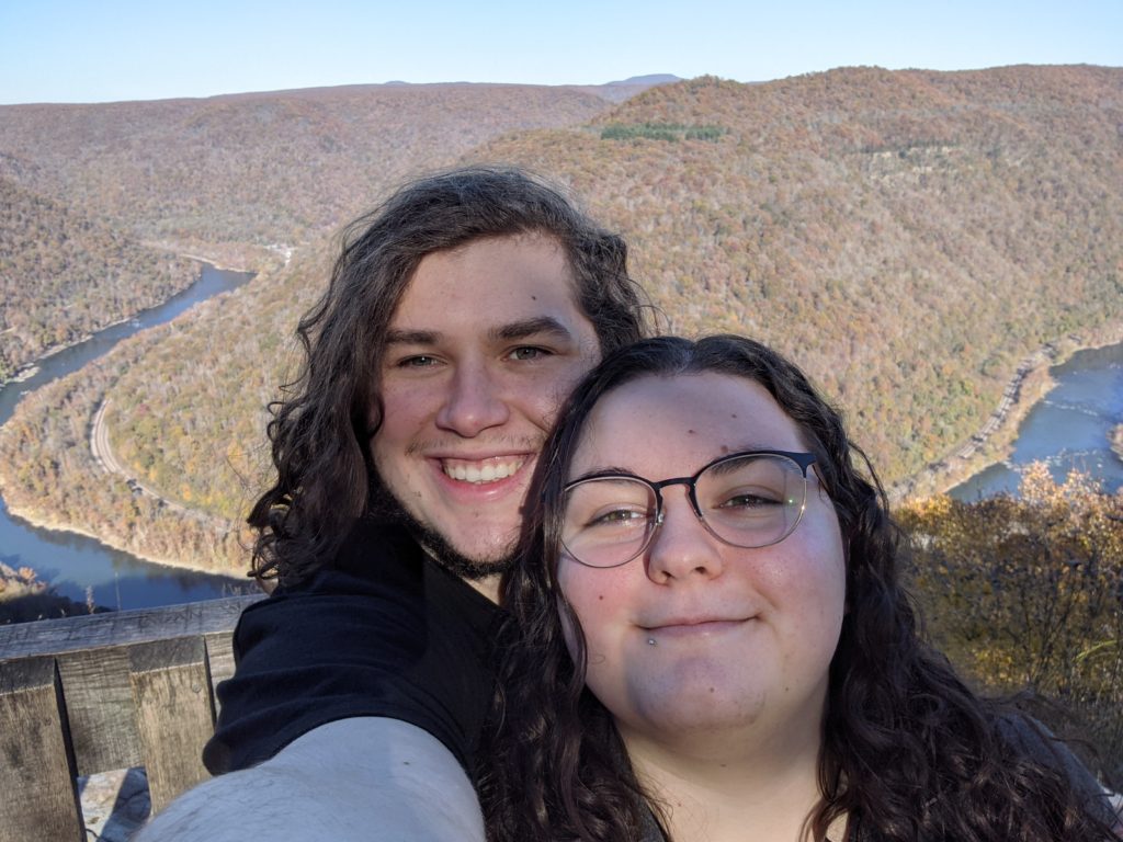 Justin and Caitlin standing above river overlook at New River Gorge, West Virginia